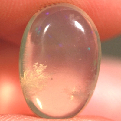 SOLID CRYSTAL OPAL Crystal growing inside a transparent body